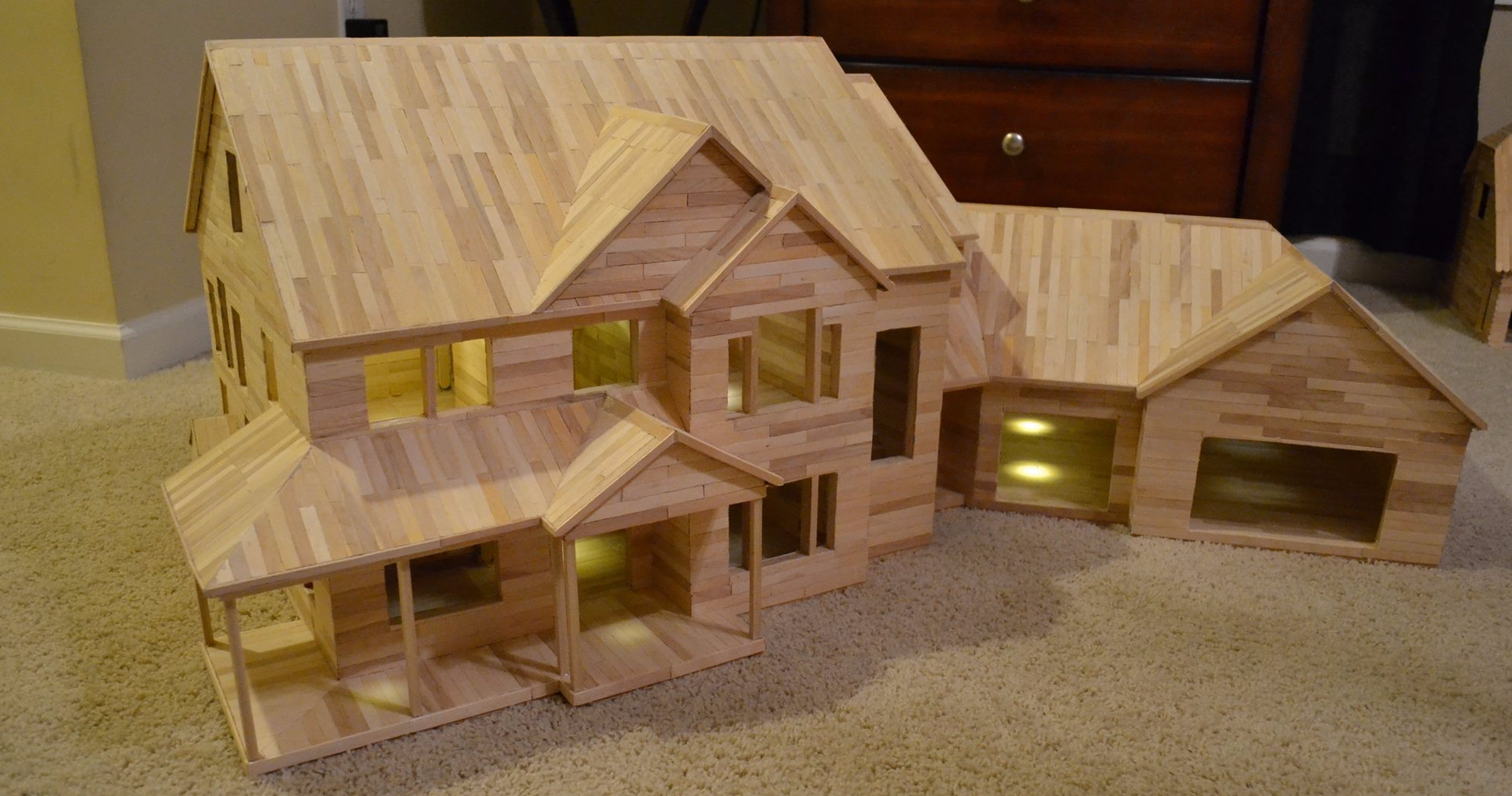 doll house made of popsicle sticks