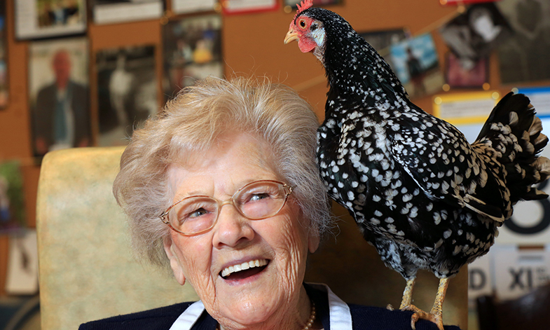 Woman with her hen