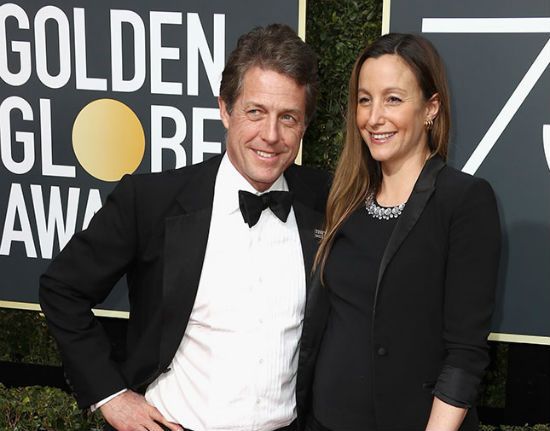 Hugh Grant and his girlfriend Anna Eberstein.