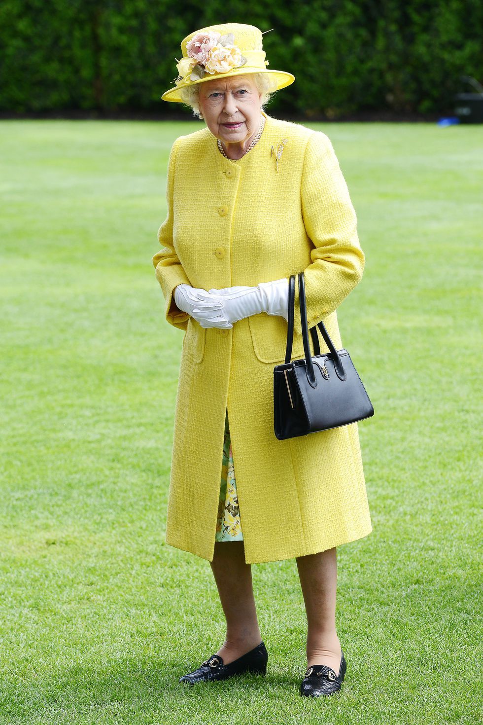 Queen Elizabeth Wears Bright Outfits For The Sweetest Reason