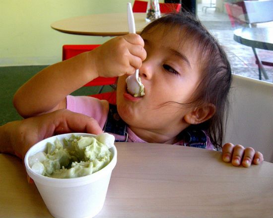 Child eating yogurt