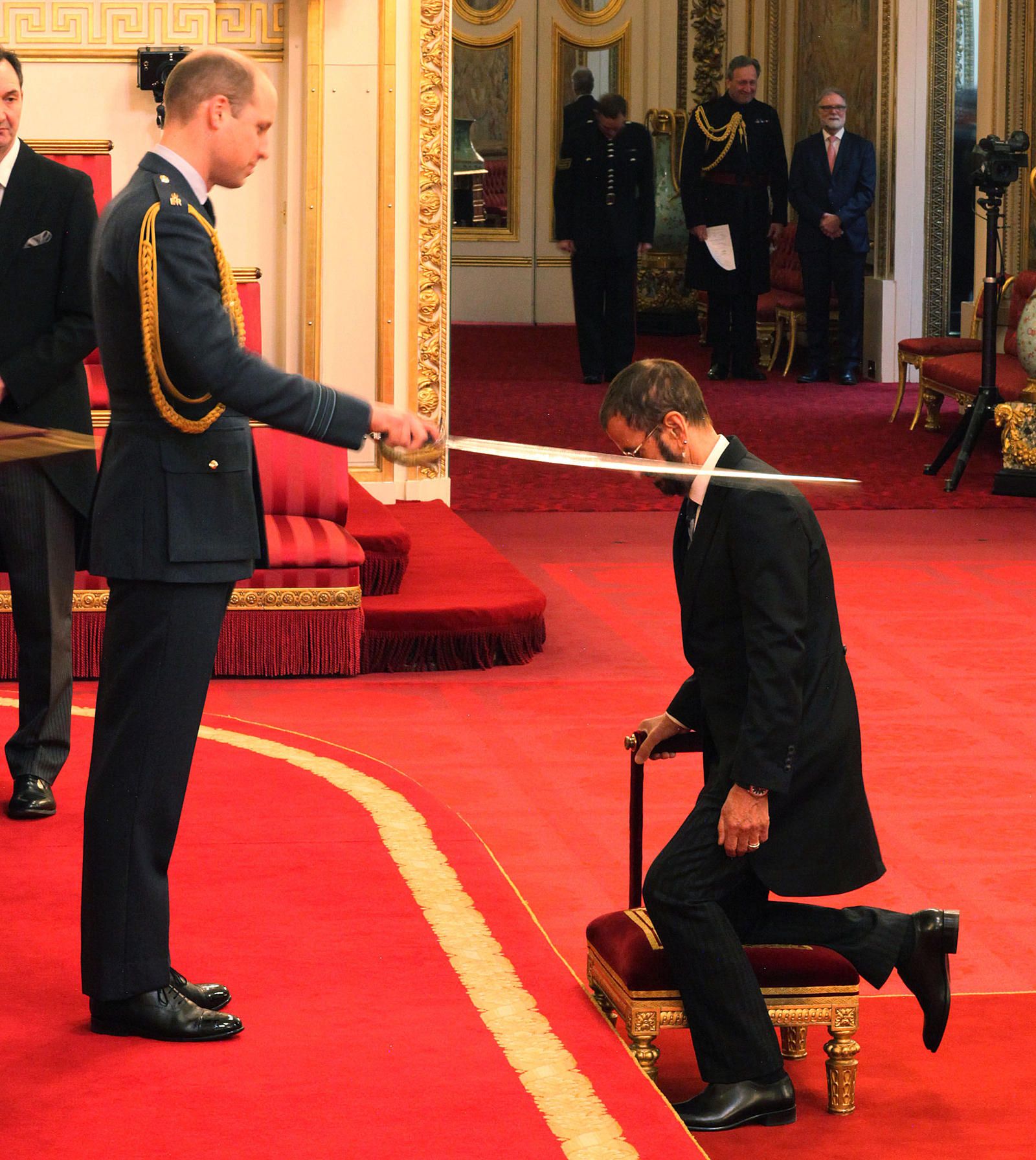 Ringo Starr being Knighted by Prince William