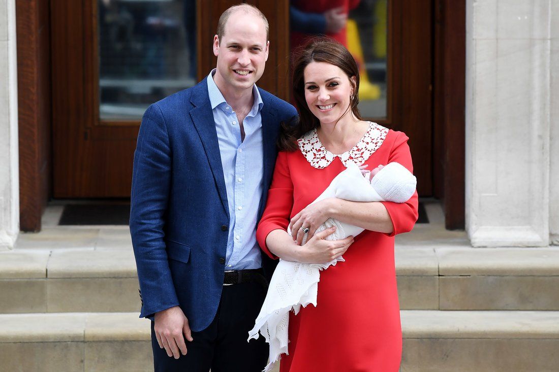 William and Kate leaving the hospital with their newborn son