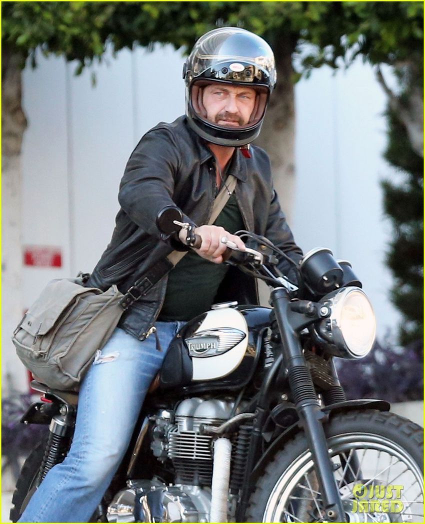 Gerard Butler riding his motorcycle