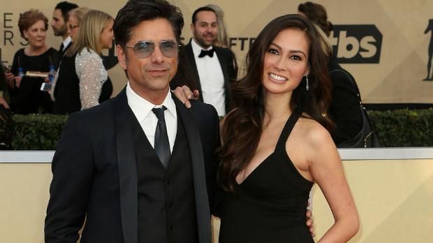 John Stamos and Caitlin McHugh