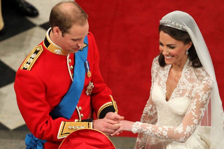 Prince William Putting on Kate's wedding band on her finger