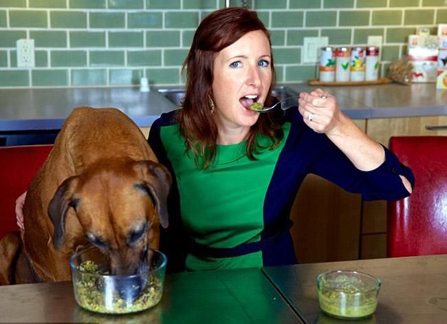 A woman eating dog food