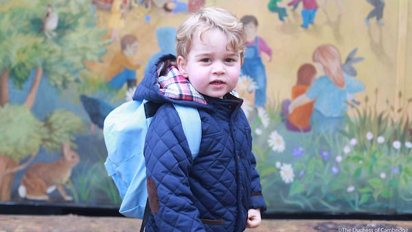 Prince George wearing a backpack