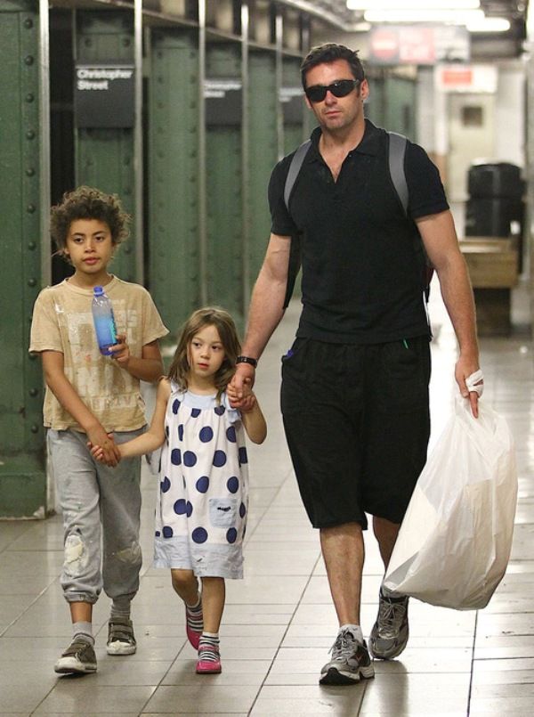 Hugh Jackman walking with his two children