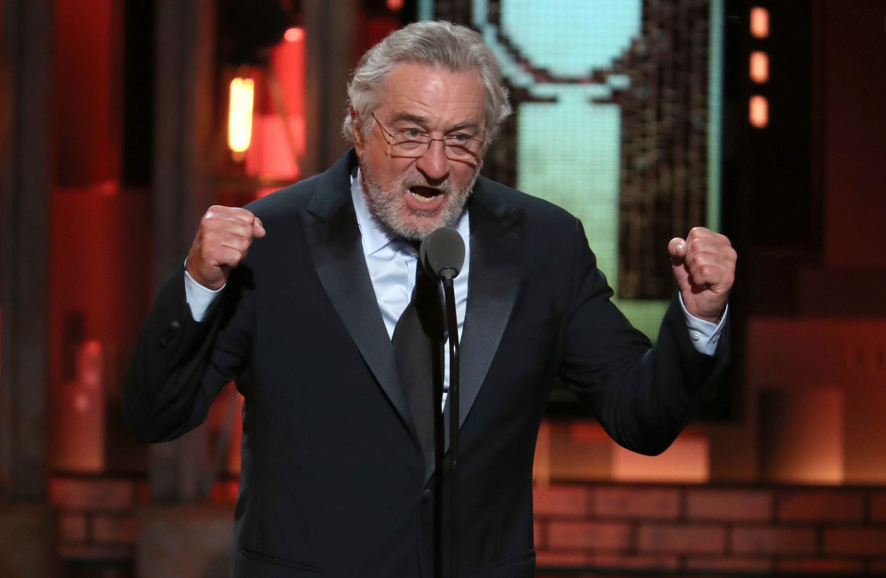 Robert De Niro introduces a performance by Bruce Springsteen at the 72nd annual Tony Awards