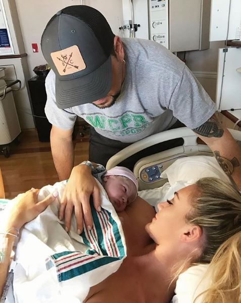 Jason and Brittany with their newborn baby