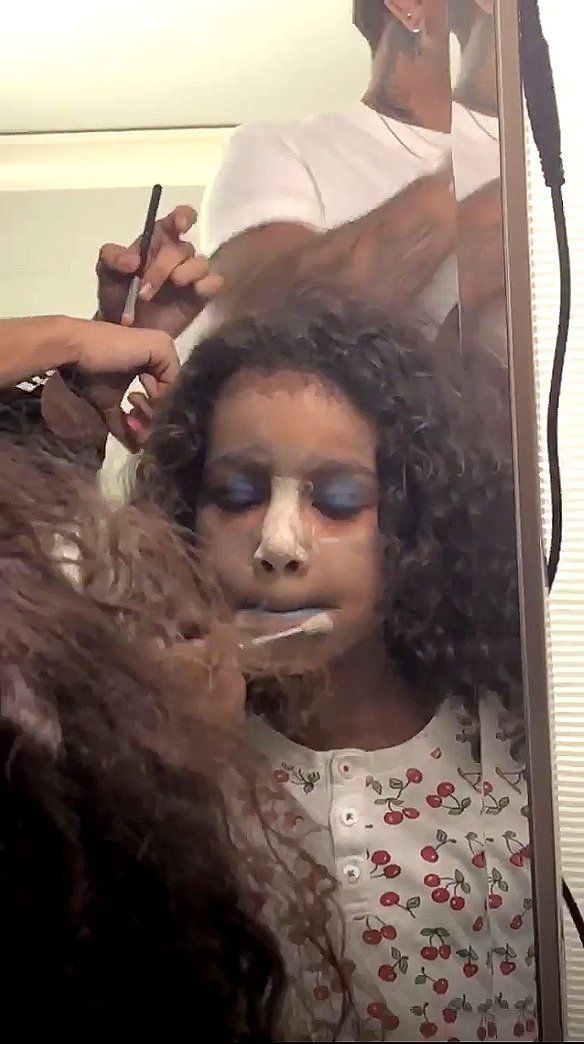 North putting on makeup