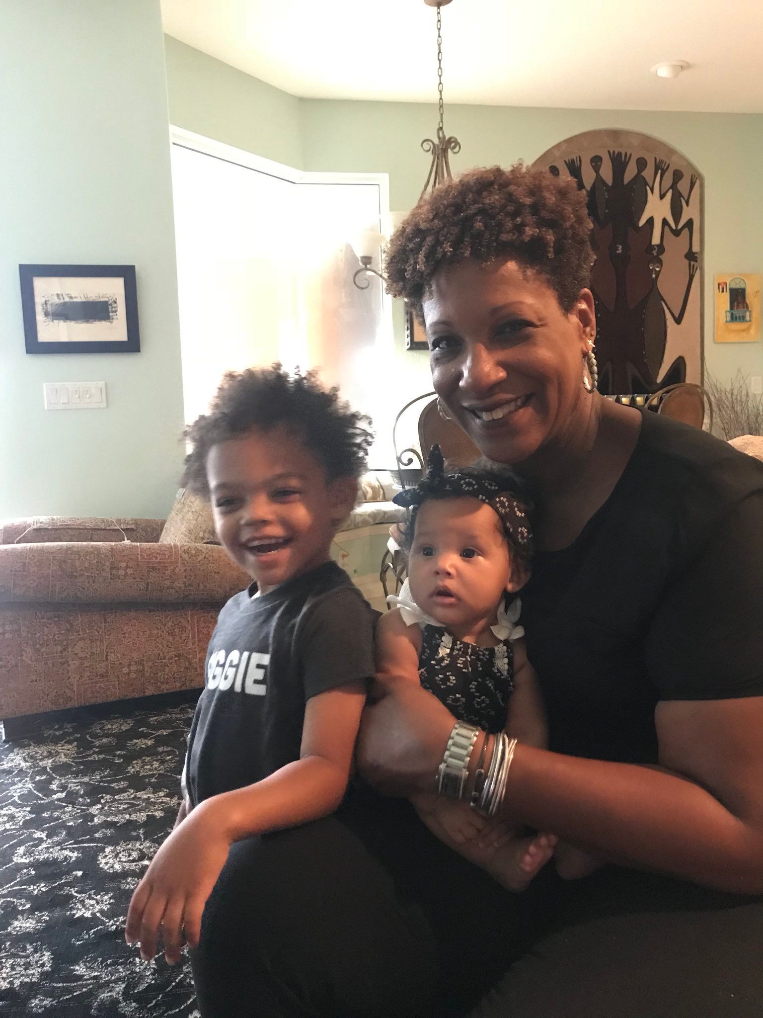 Dr. Janet with her two grandkids