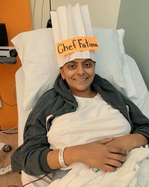 Fatima Ali with a paper chef's hat on