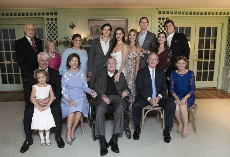 The newlyweds pictured with their families