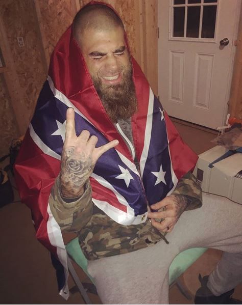 David Eason draped with the Confederate Flag