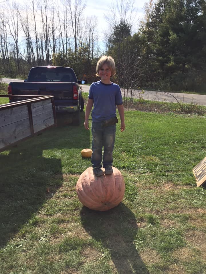 Ian Unger with his pumpkins