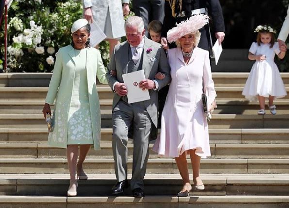 Prince Charles, Camilla Parker Bowles and Doria Ragland walk down the steps of the chapel