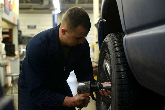 Changing a tire.