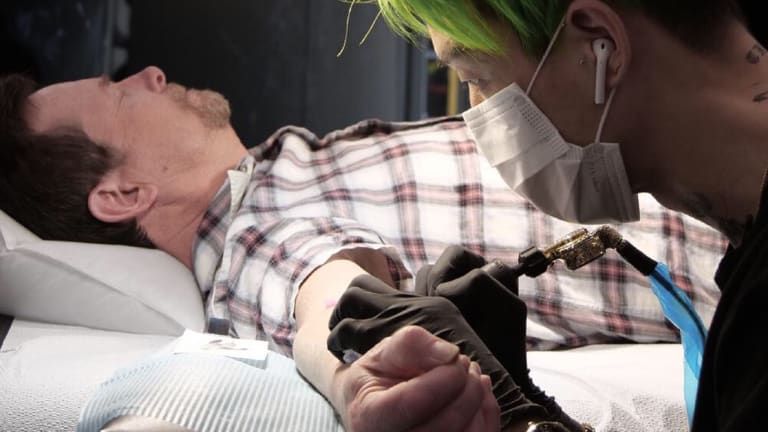 Michael J. Fox getting a tattoo