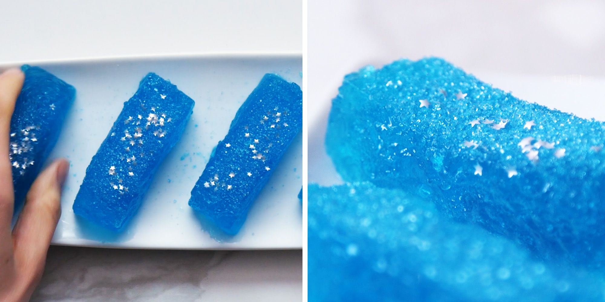 Fancy rectangualar, blue Jello shots laying on a tray and garnished with edible glitter