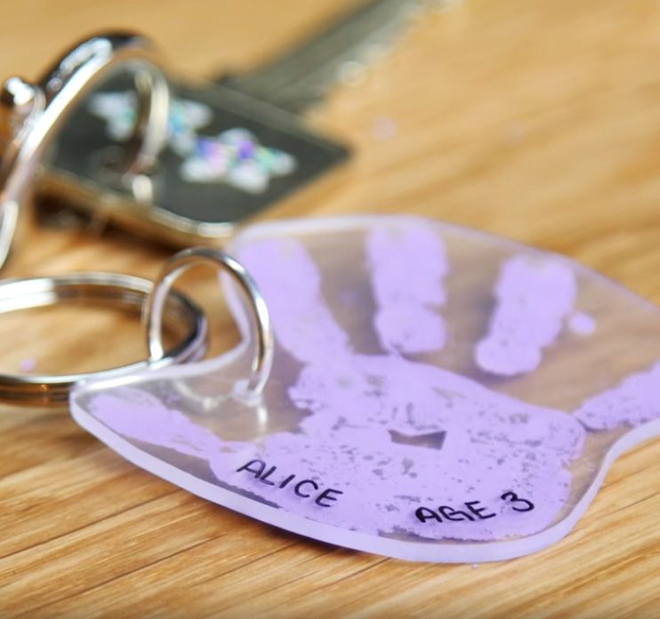 purple children's handprint keychain