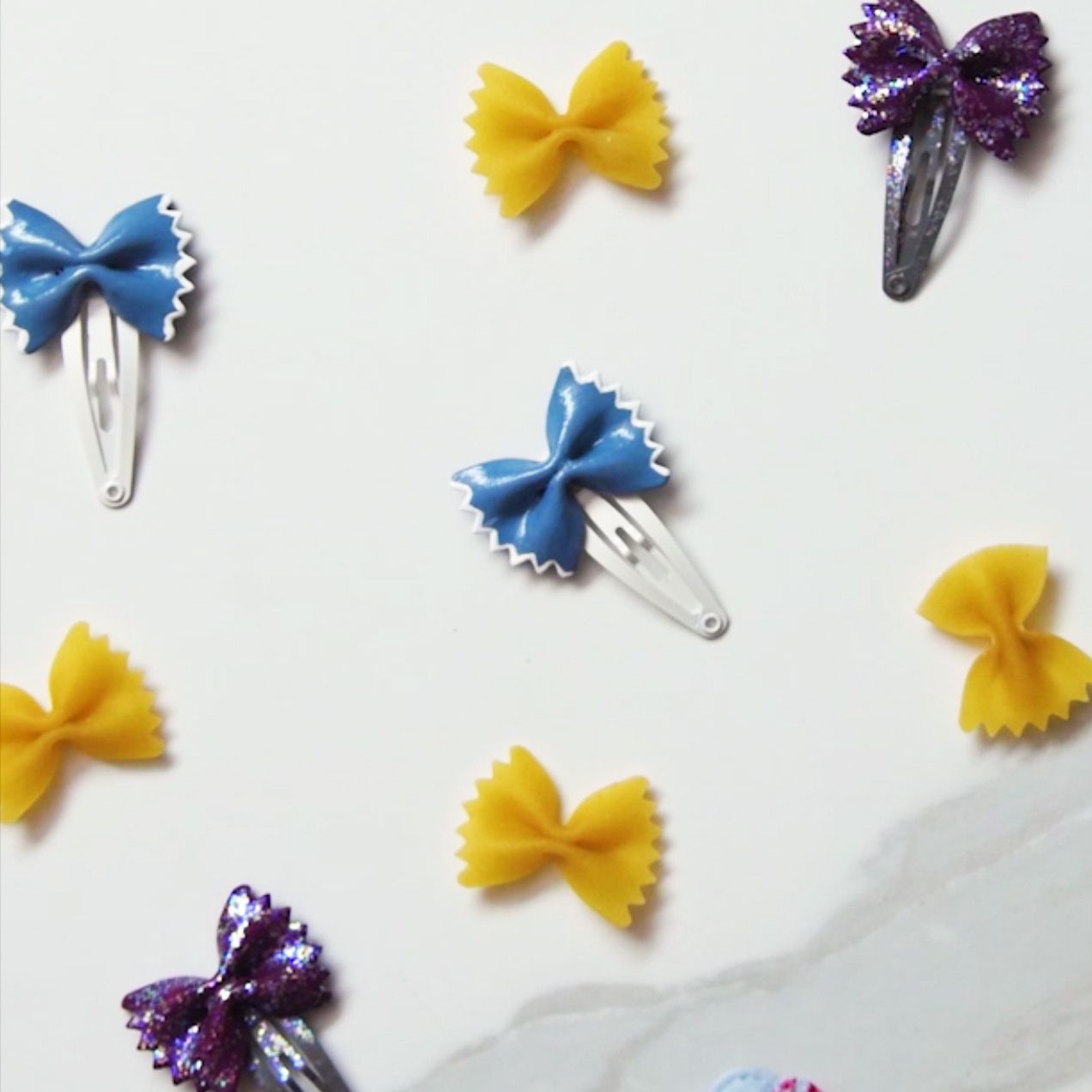 dry bowtie pasta and hair clips