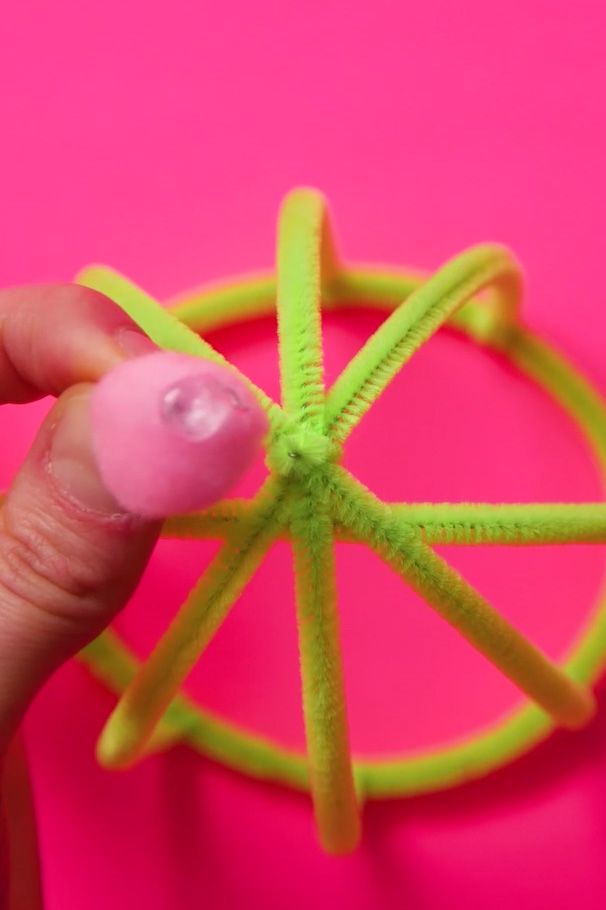 overhead view of the top of a cactus craft made of green pipecleaner