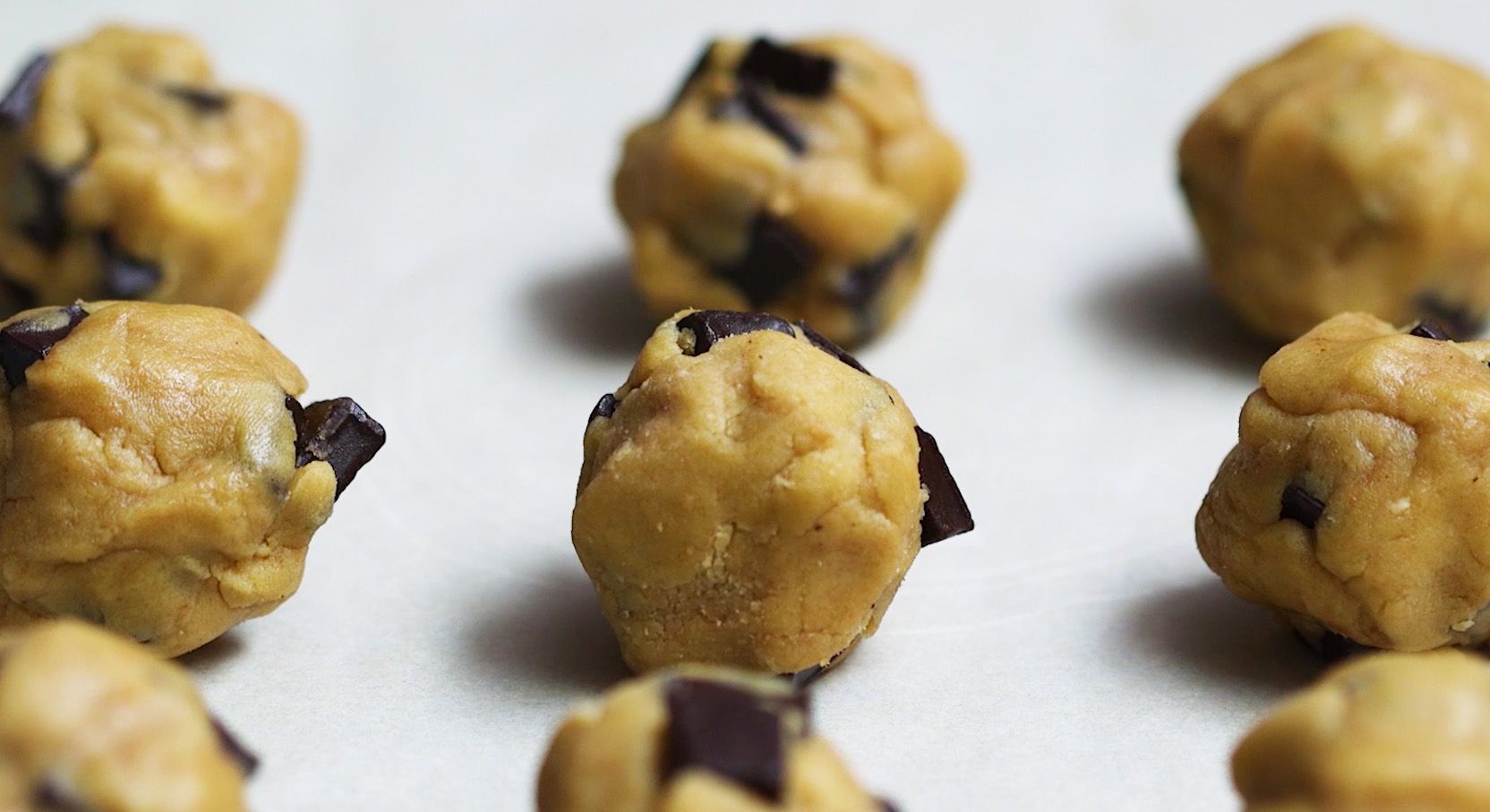 chocolate chip cookies on a pan ready to bake