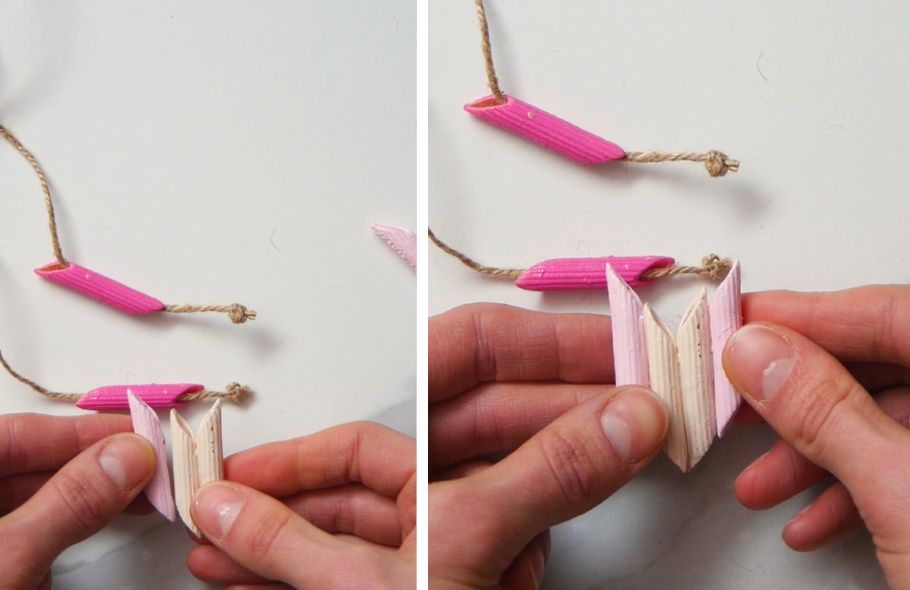 gluing penne noodles together to create a necklace pendant