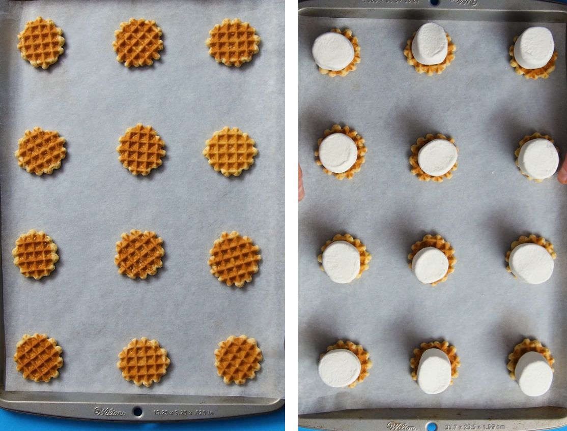 12 mini waffle wafers places on a silver baking sheet with 12 large marshmallows on top of them 