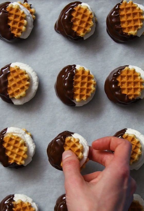 tray of mini smore waffle wafer sandwiches half dipped in chocolate