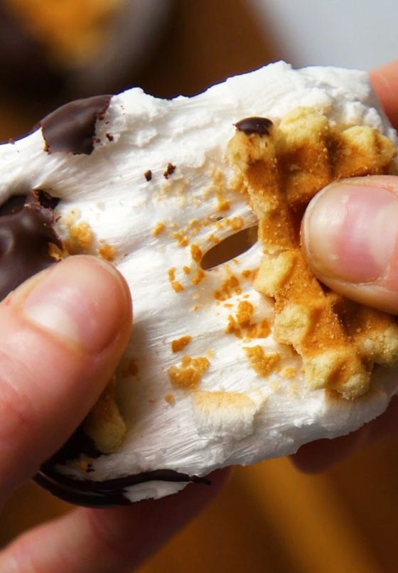 close up of smore sandwich being torn in half 