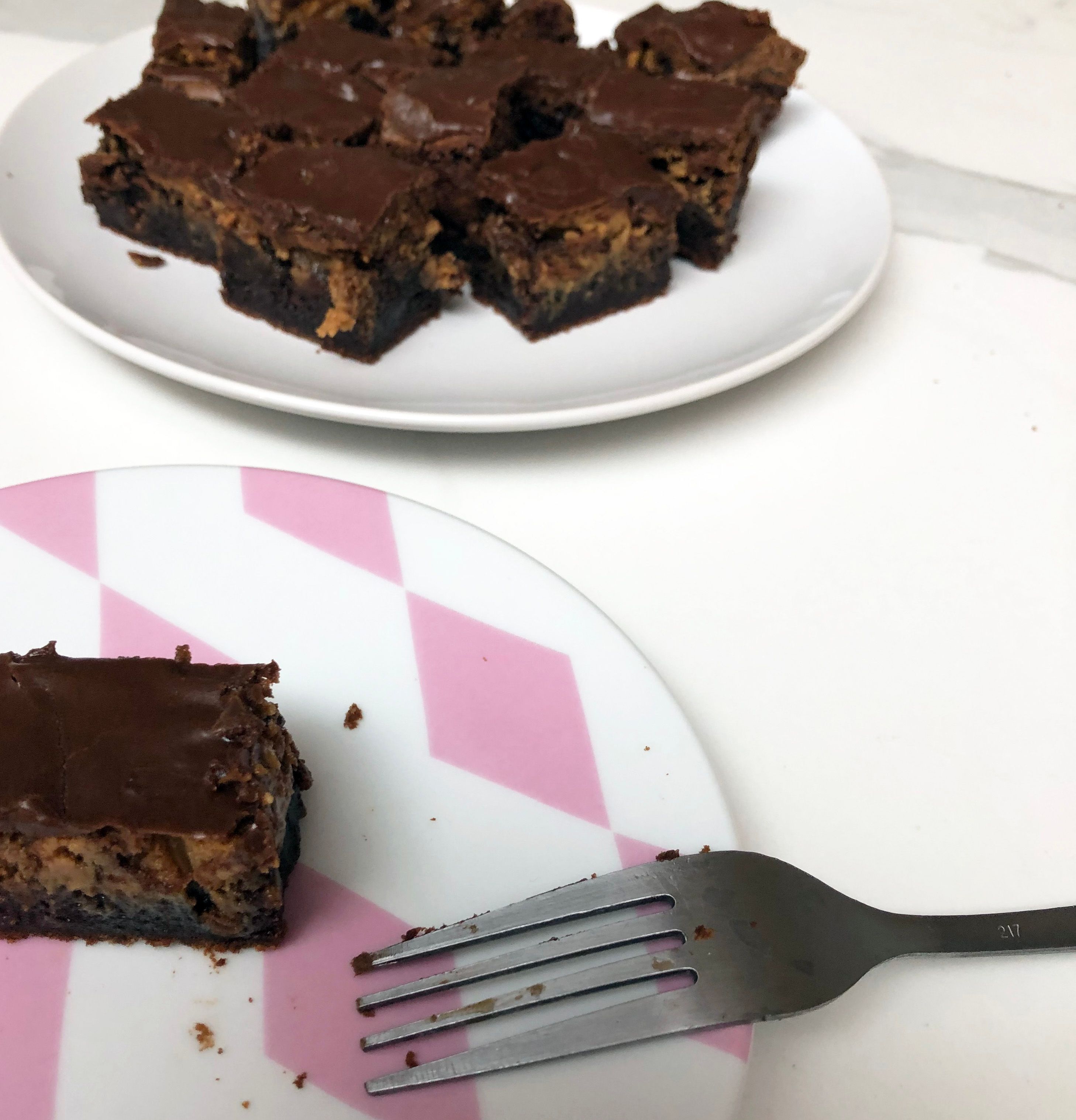 completed chocolate peanut butter fetish brownies on a plate