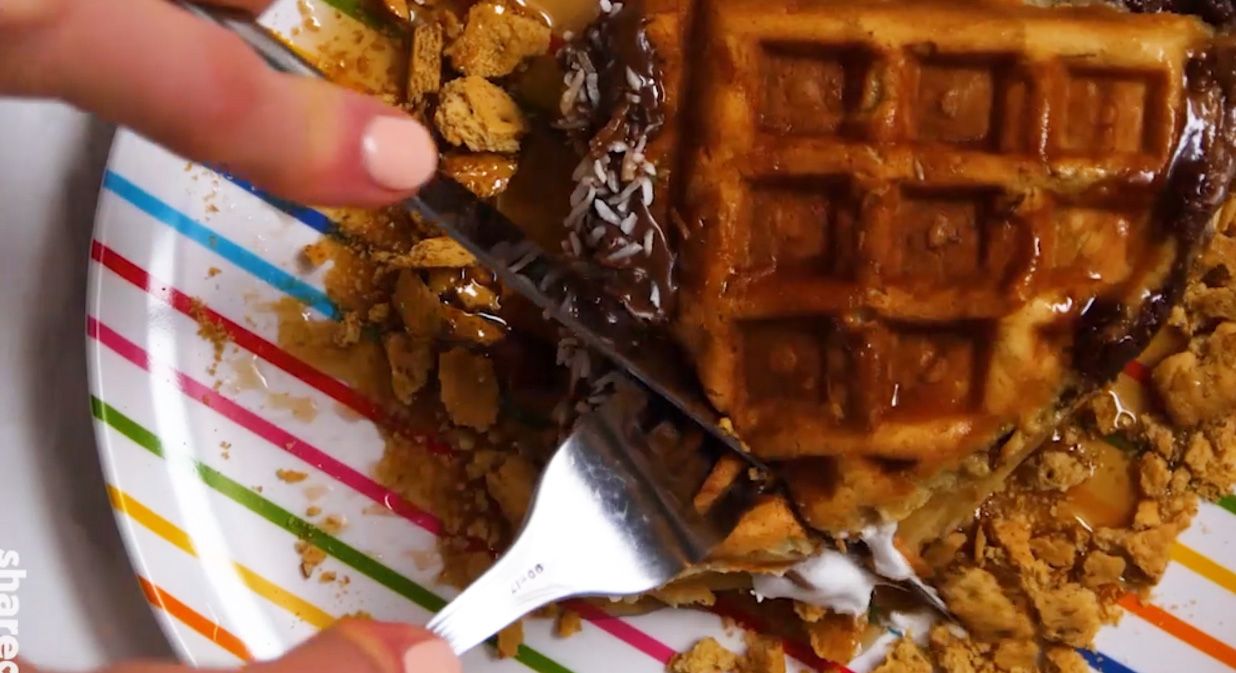 smore waffle being cut with silver utensils